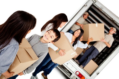 Removal team preparing a move in a Fulham residential street