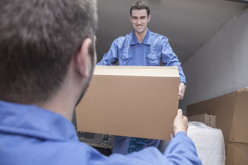 Moving van and boxes outside a Fulham residential property
