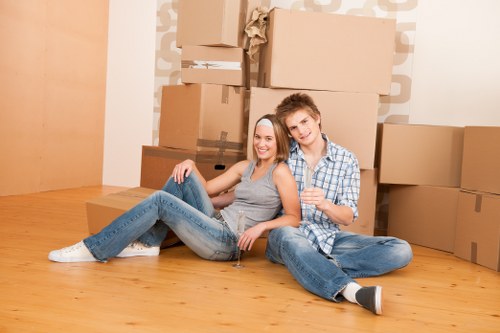 A prepared living room with moving boxes in a Fulham home