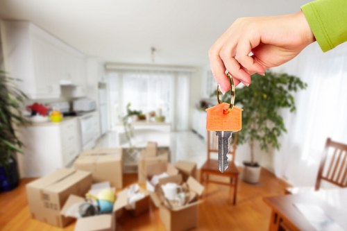 Loading boxes and household items into a van in Fulham