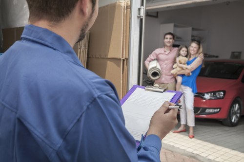 Local moving team loading furniture near Fulham flats