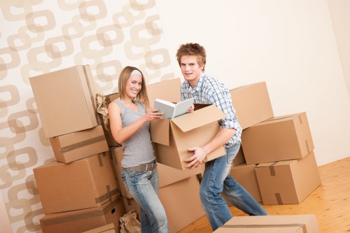 Professional movers loading household items for a Fulham relocation