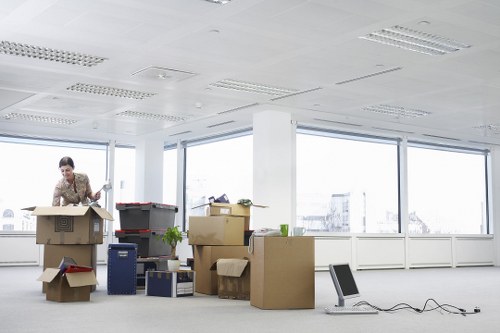 Packed office equipment ready for transport during a Fulham relocation