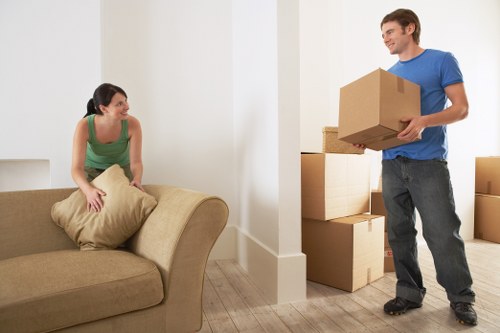 Loading household items into a van for a Fulham move